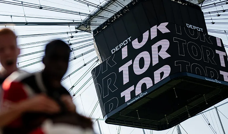 Two Eintracht Frankfurt players celebrate and the video cube is visible with the inscription ‘GOAL’. (Photo)