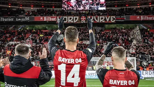 Patrik Schick, Alejandro Grimaldo and Aleix García from Bayer Leverkusen applaud the north stand in Leverkusen. (Photo)